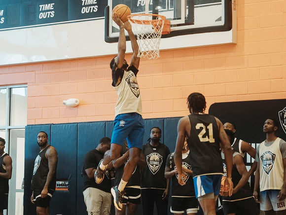 Titans player dunking a basketball