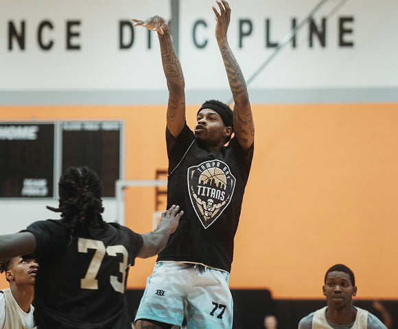 Titans player shooting a basketball